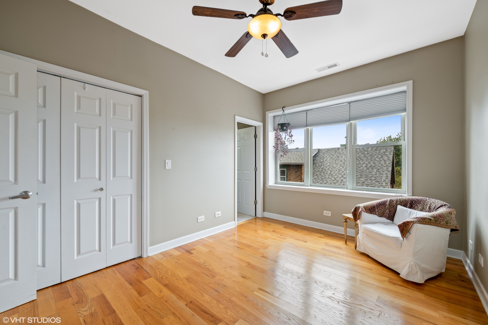 2108 North Spaulding Avenue, Unit 4 Chicago, IL 60647 - Photo 7 of 10 a bedroom with furniture and window