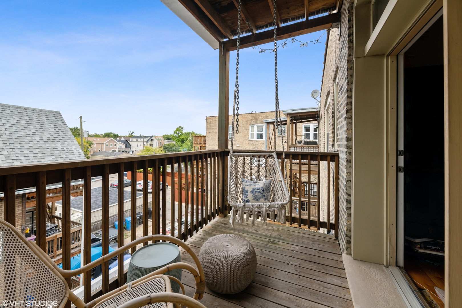 2108 North Spaulding Avenue, Unit 4 Chicago, IL 60647 - Photo 10 of 10 a balcony with table and chairs