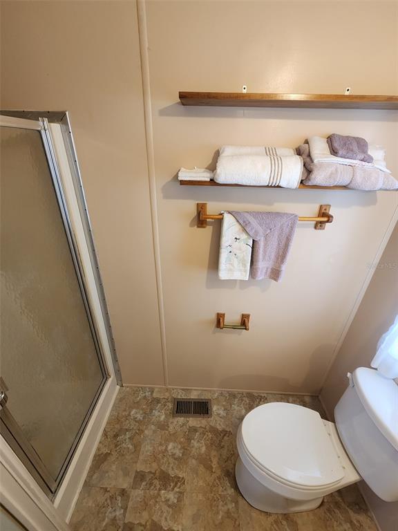 6400 Taylor/trout Road, Unit 96 Punta Gorda, FL 33950 - Photo 14 of 17 a bathroom with a toilet