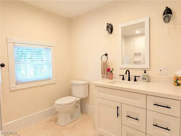a bathroom with a shower and a sink
