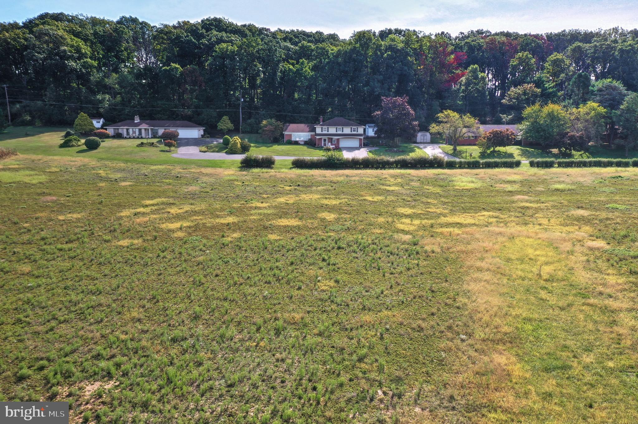 Lot #3 Midhill Road Spring Grove, PA 17362 - Photo 5 of 5 a view of a lake with houses in the back
