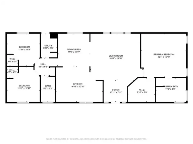 an aerial view of a house with garden space and outdoor seating