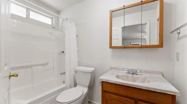 a bedroom with bed and window