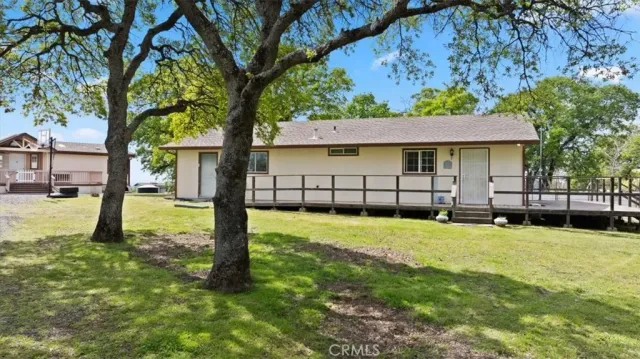 a balcony with table and chairs
