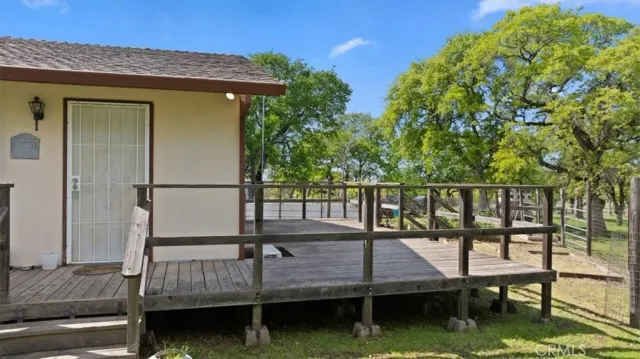 a view of a field with trees