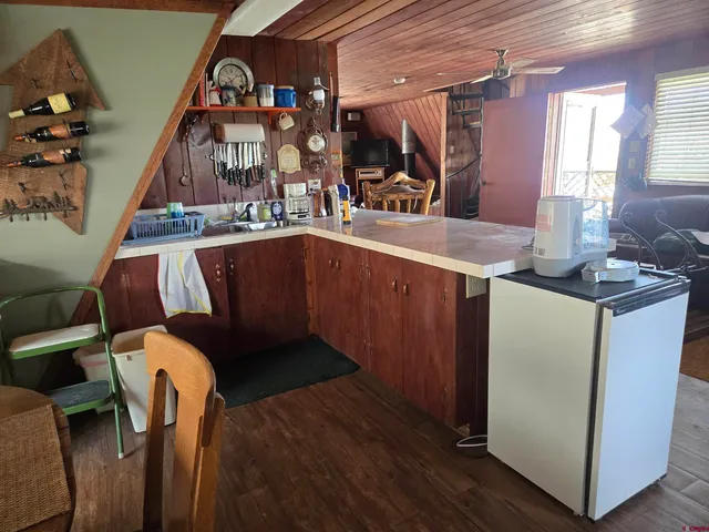 a view of a hallway with washer and dryer