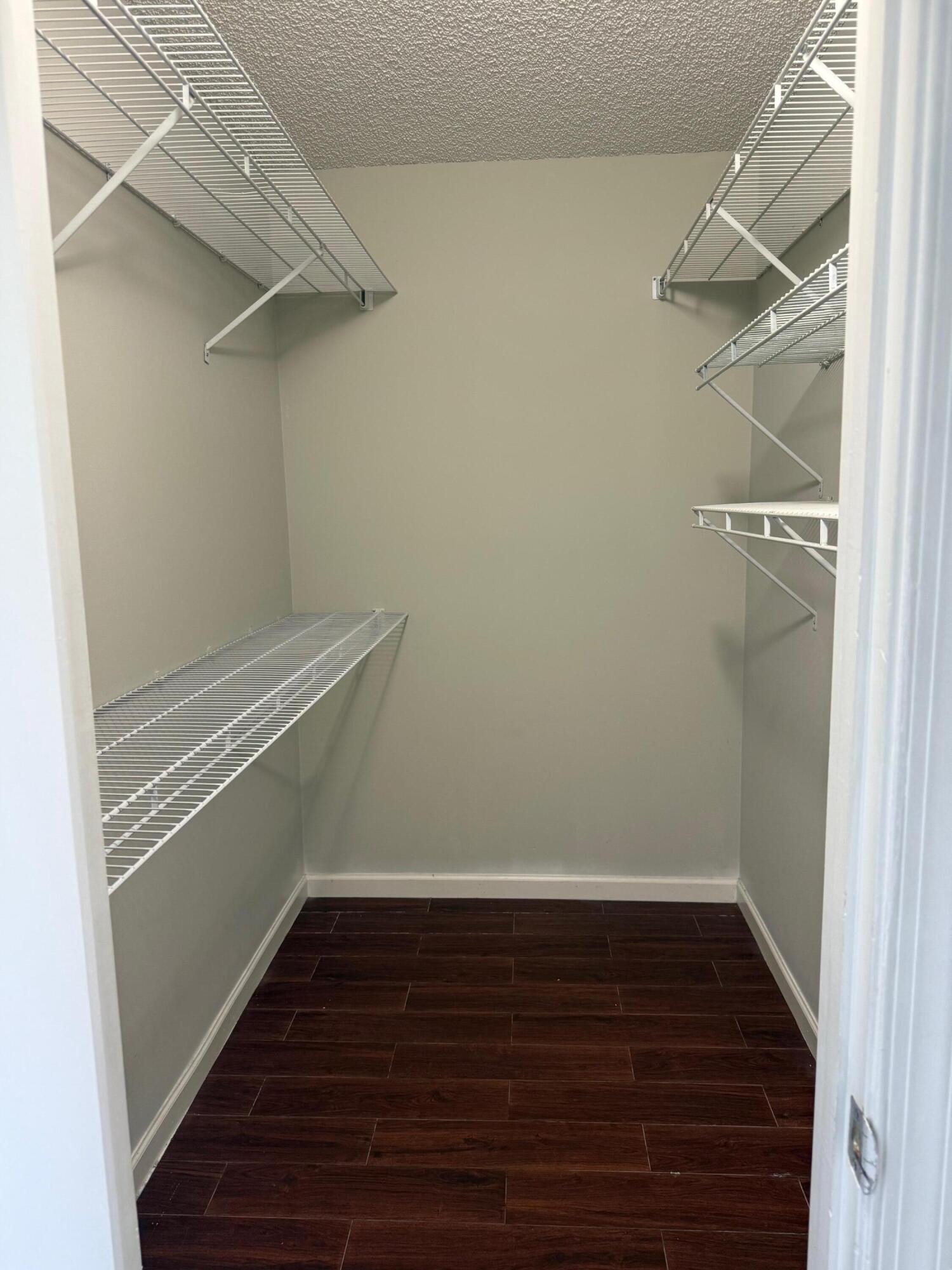 22492 Middletown Drive Boca Raton, FL 33428 - Photo 11 of 35 a view of an empty walk in closet