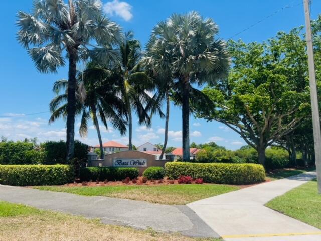 22492 Middletown Drive Boca Raton, FL 33428 - Photo 27 of 35 a front view of multi story residential apartment building with yard and green space