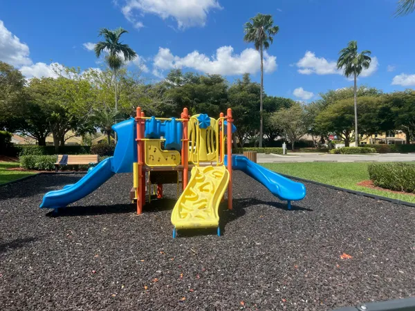 a view of a park with slide