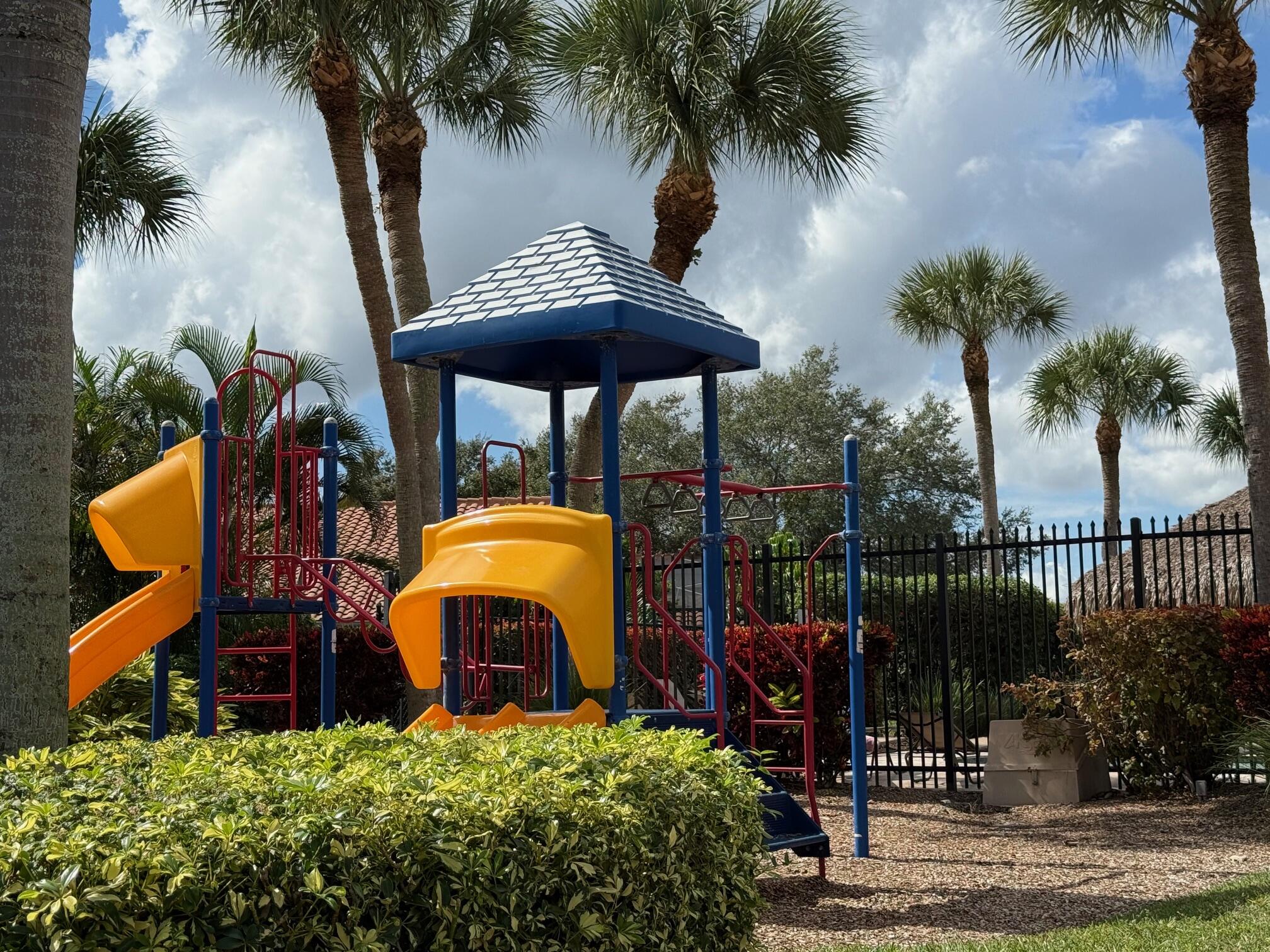 22492 Middletown Drive Boca Raton, FL 33428 - Photo 32 of 35 an outdoor space with furniture and palm tree