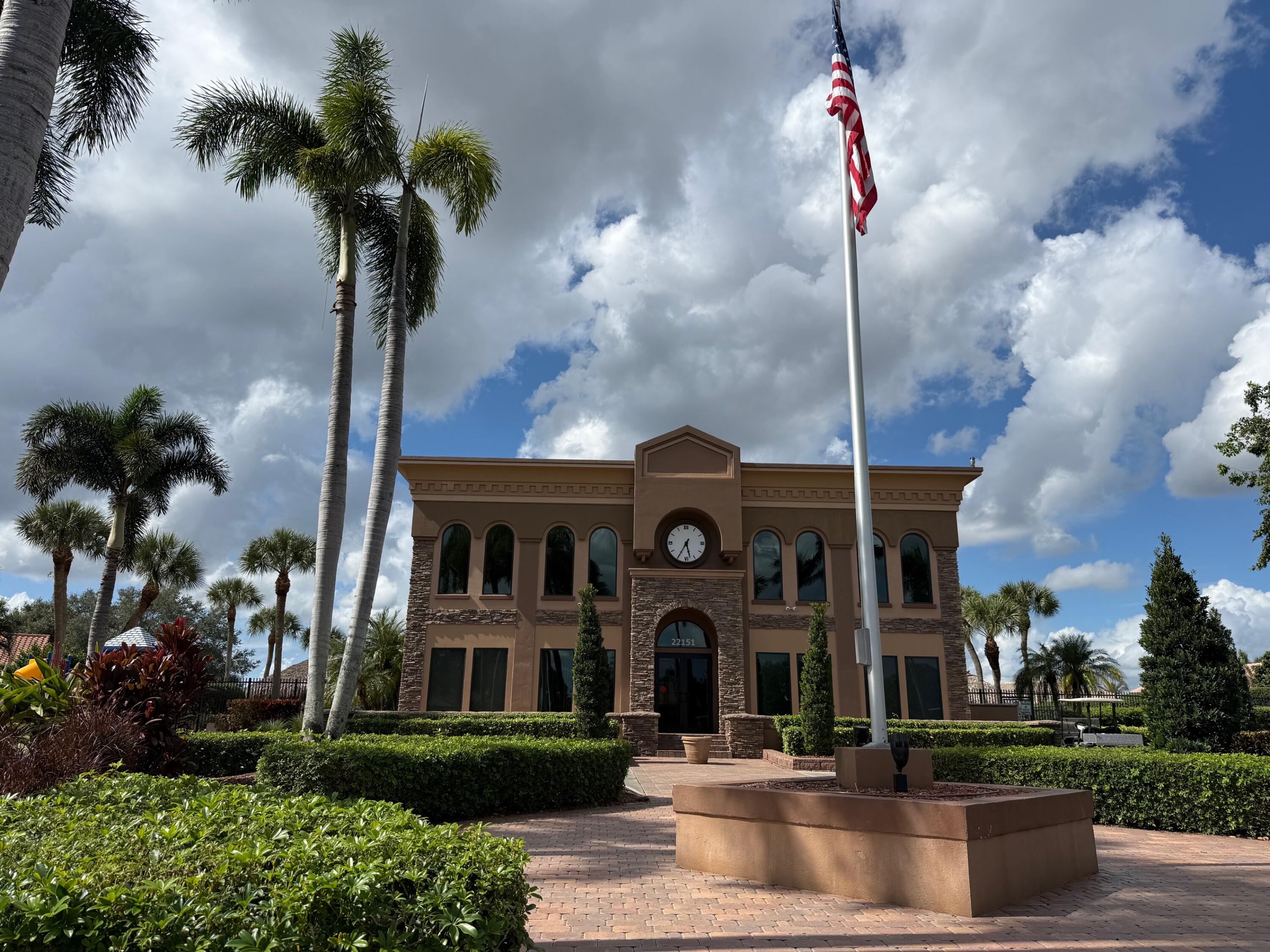 22492 Middletown Drive Boca Raton, FL 33428 - Photo 34 of 35 a front view of a building with garden