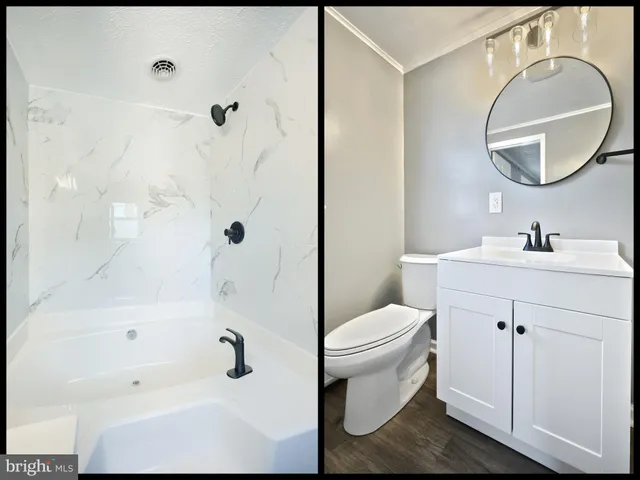 an empty room with windows and fireplace