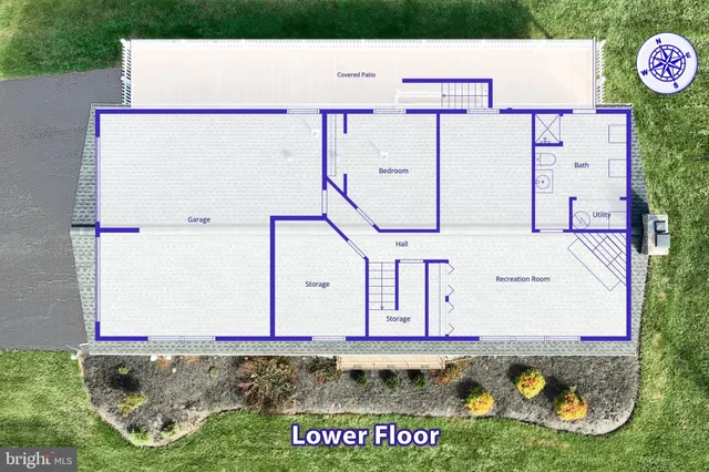 a bathroom with a toilet a sink and a mirror