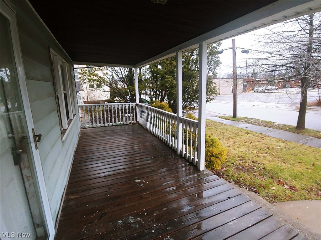 1464 Sherbrook Road Cleveland, OH 44121 - Photo 2 of 15 Wooden terrace with a lawn