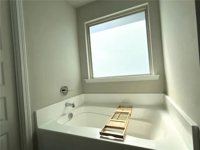 a bathroom with a bathtub