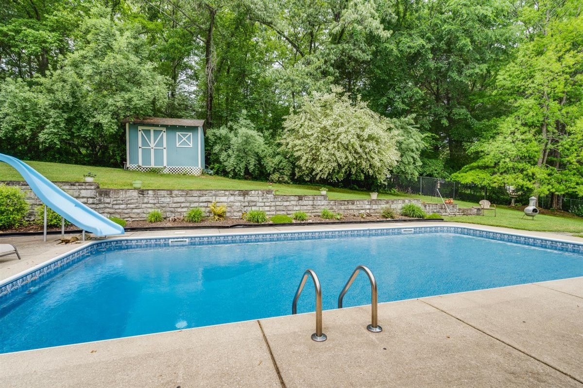 7418 Chester Road Fairview, TN 37062 - Photo 36 of 48 a view of swimming pool with a backyard
