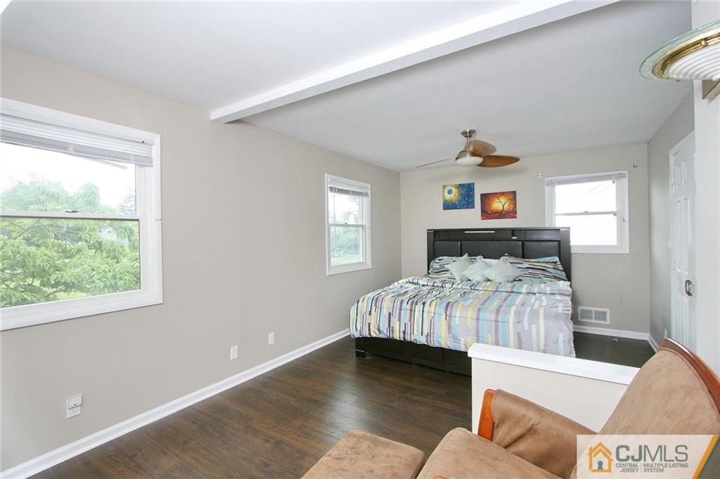 15 Leland Road Edison, NJ 08817 - Photo 19 of 25 a bedroom with a bed and window