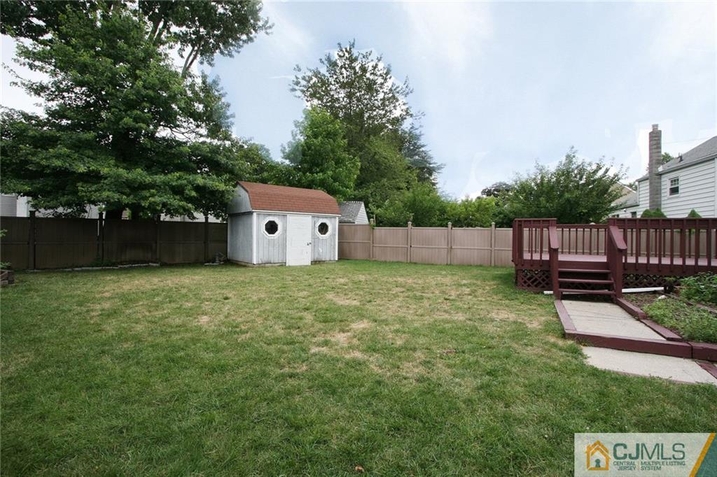 15 Leland Road Edison, NJ 08817 - Photo 22 of 25 a house view with a backyard space