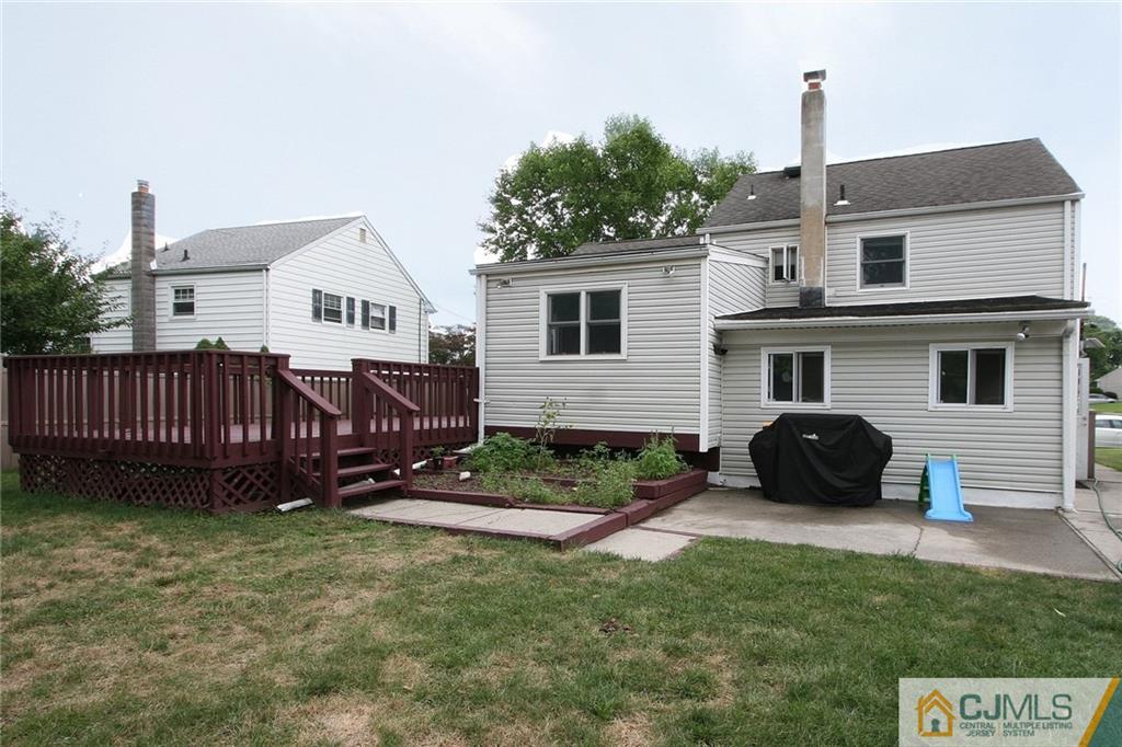 15 Leland Road Edison, NJ 08817 - Photo 23 of 25 a view of a house with a yard and deck