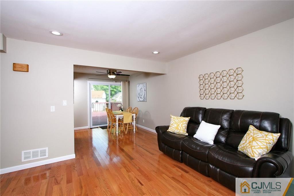 15 Leland Road Edison, NJ 08817 - Photo 5 of 25 a living room with furniture and a wooden floor