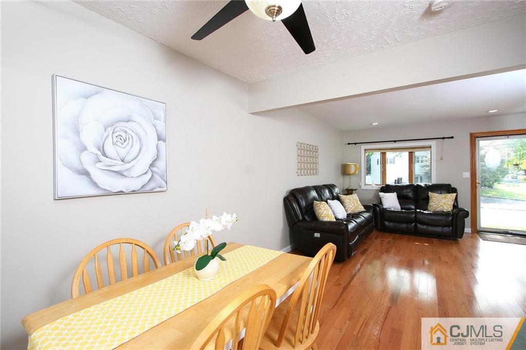 15 Leland Road Edison, NJ 08817 - Photo 6 of 25 a living room with furniture and a window