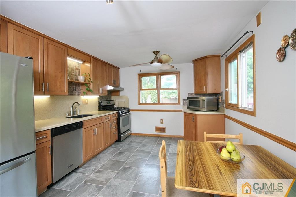 15 Leland Road Edison, NJ 08817 - Photo 9 of 25 a large kitchen with a large window
