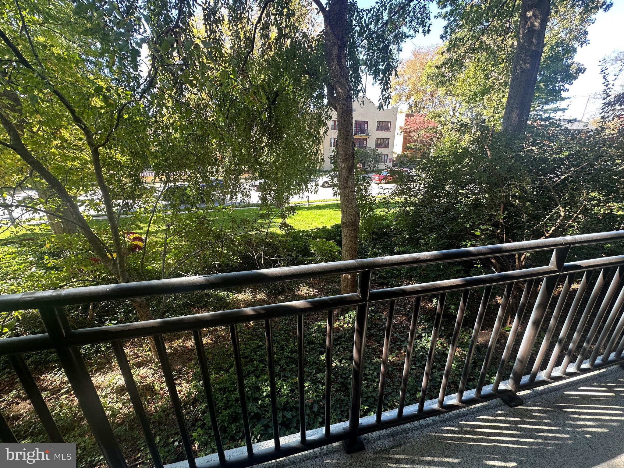 41 Conshohocken State Road, Unit 109 Bala Cynwyd, PA 19004 - Photo 14 of 23 a view of balcony with wooden floor and fence