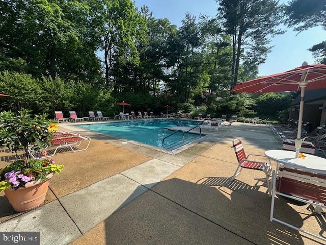 41 Conshohocken State Road, Unit 109 Bala Cynwyd, PA 19004 - Photo 21 of 23 a chair and tables in the patio