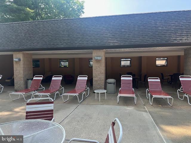 41 Conshohocken State Road, Unit 109 Bala Cynwyd, PA 19004 - Photo 22 of 23 a front view of a house with outdoor seating