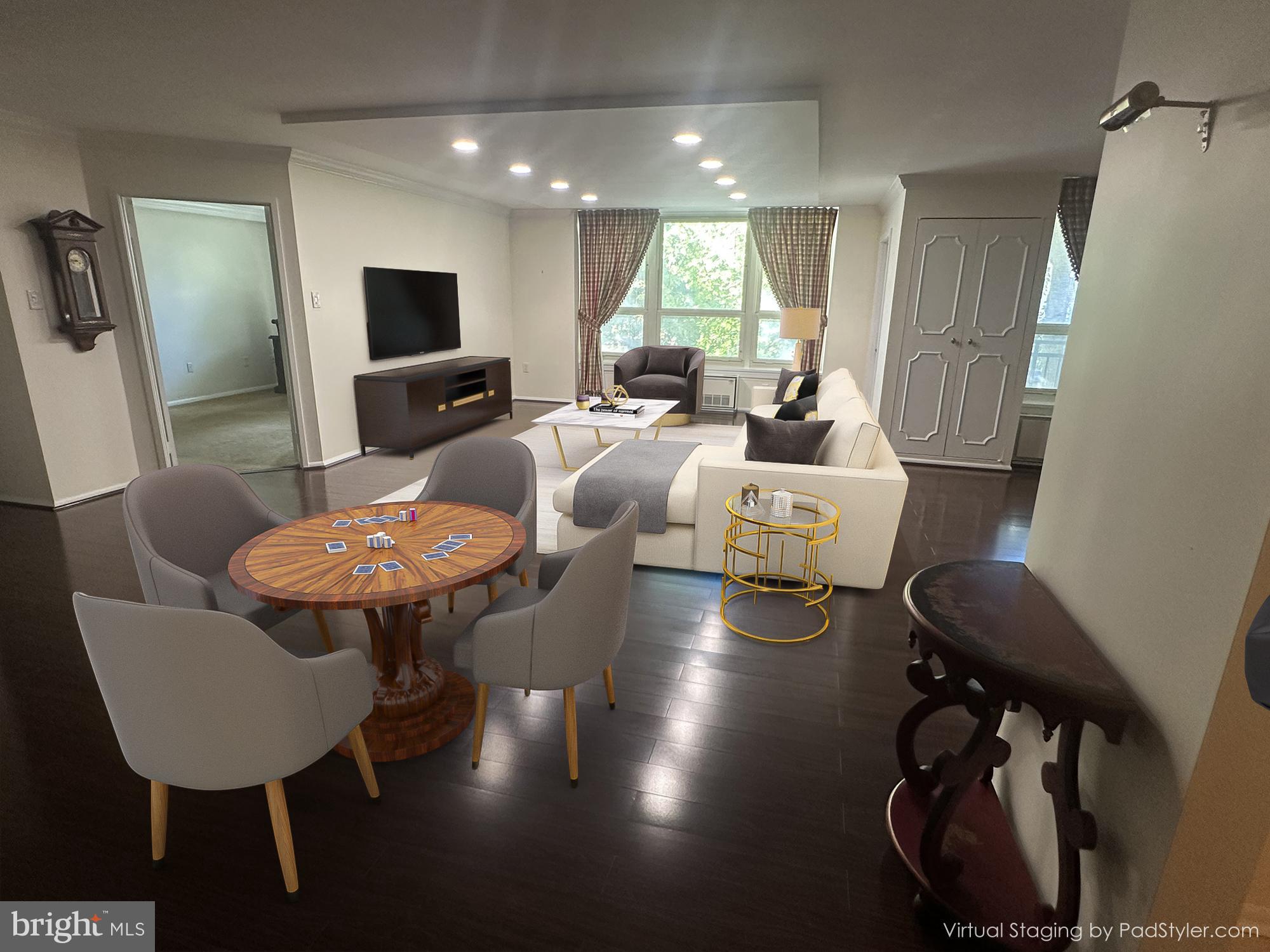 41 Conshohocken State Road, Unit 109 Bala Cynwyd, PA 19004 - Photo 3 of 23 a living room with furniture and a flat screen tv