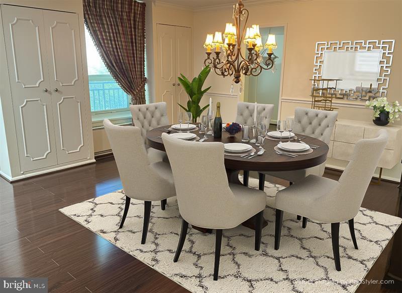 41 Conshohocken State Road, Unit 109 Bala Cynwyd, PA 19004 - Photo 5 of 23 a view of a dining room with furniture and wooden floor