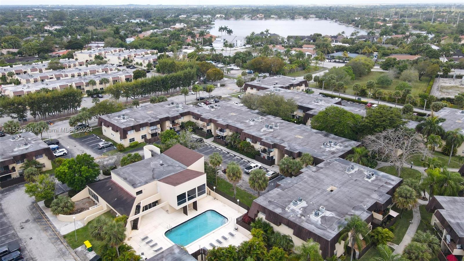 9107 Southwest 137th Terrace, Unit 14 Miami, FL 33186 - Photo 25 of 25 an aerial view of residential houses with outdoor space