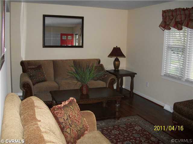 1211 Covington Road Colonial Heights, VA 23834 - Photo 5 of 11 a living room with furniture and a window