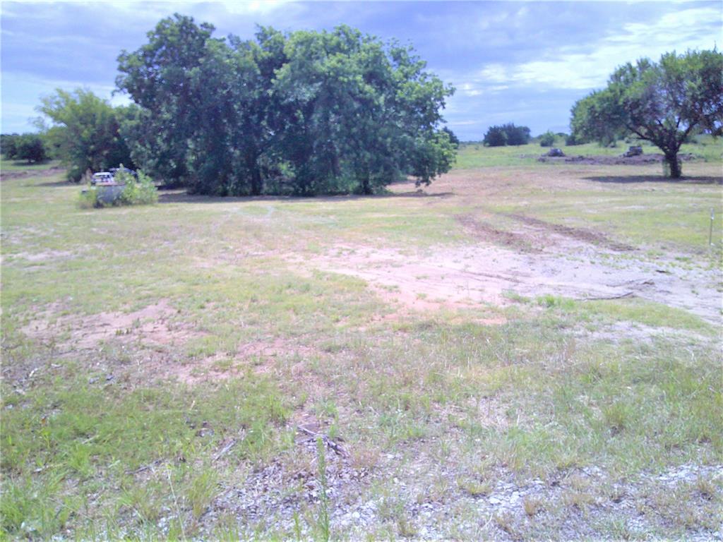 5 Border Street Montague, TX 76251 - Photo 4 of 7 a view of a yard with an outdoor space