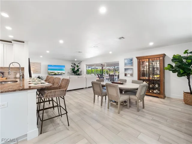 a kitchen with counter top space appliances and cabinets