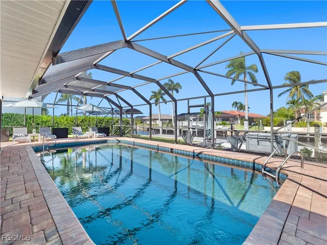 a room with lots of table and chairs