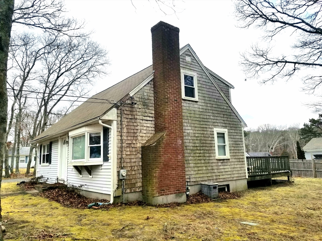 30 Princess Pine Road Hyannis, MA 02601 - Photo 5 of 10 a view of a house with a yard