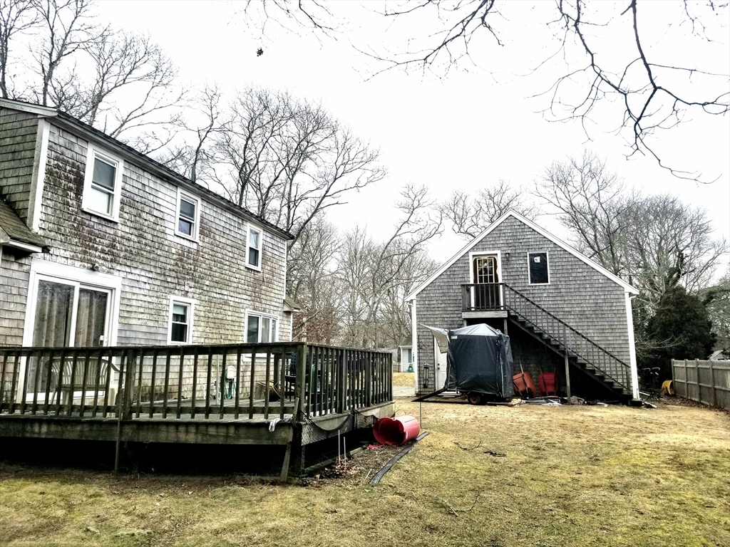 30 Princess Pine Road Hyannis, MA 02601 - Photo 8 of 10 a view of a house with a wooden roof deck