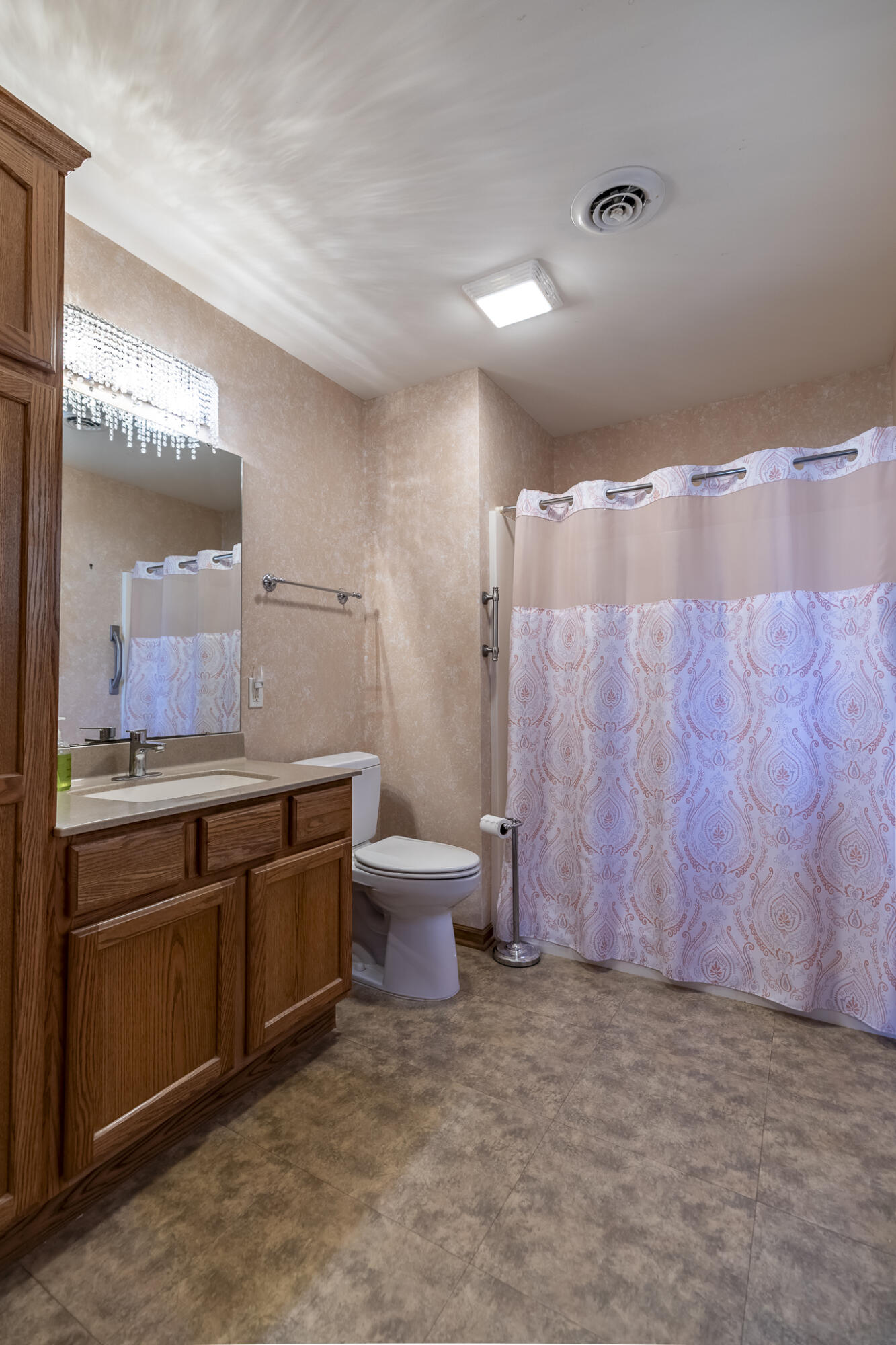 9841 Hart Street St. John, IN 46373 - Photo 13 of 28 a bathroom with a granite countertop sink a toilet and a mirror