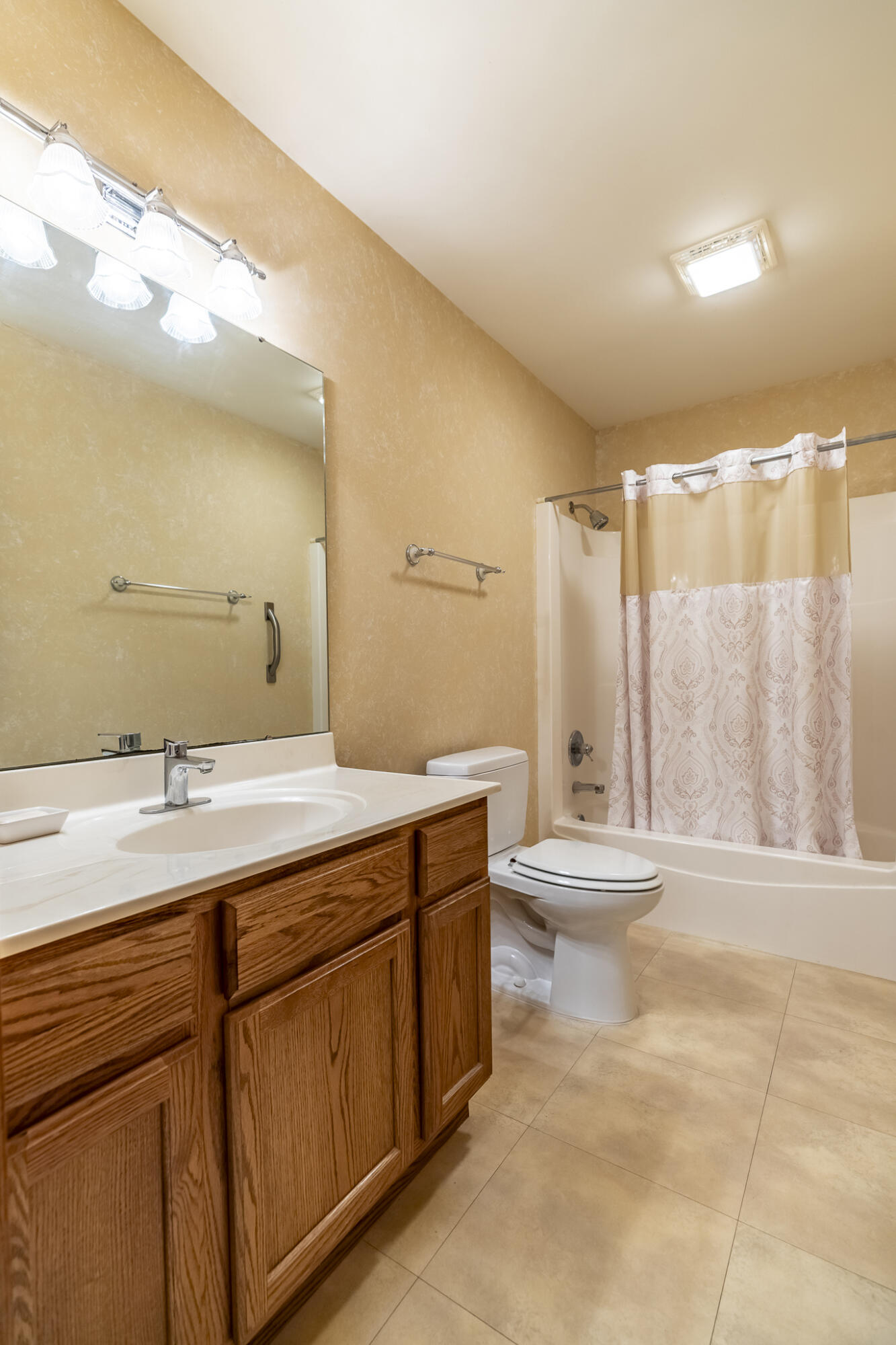 9841 Hart Street St. John, IN 46373 - Photo 16 of 28 a bathroom with a granite countertop sink toilet and shower