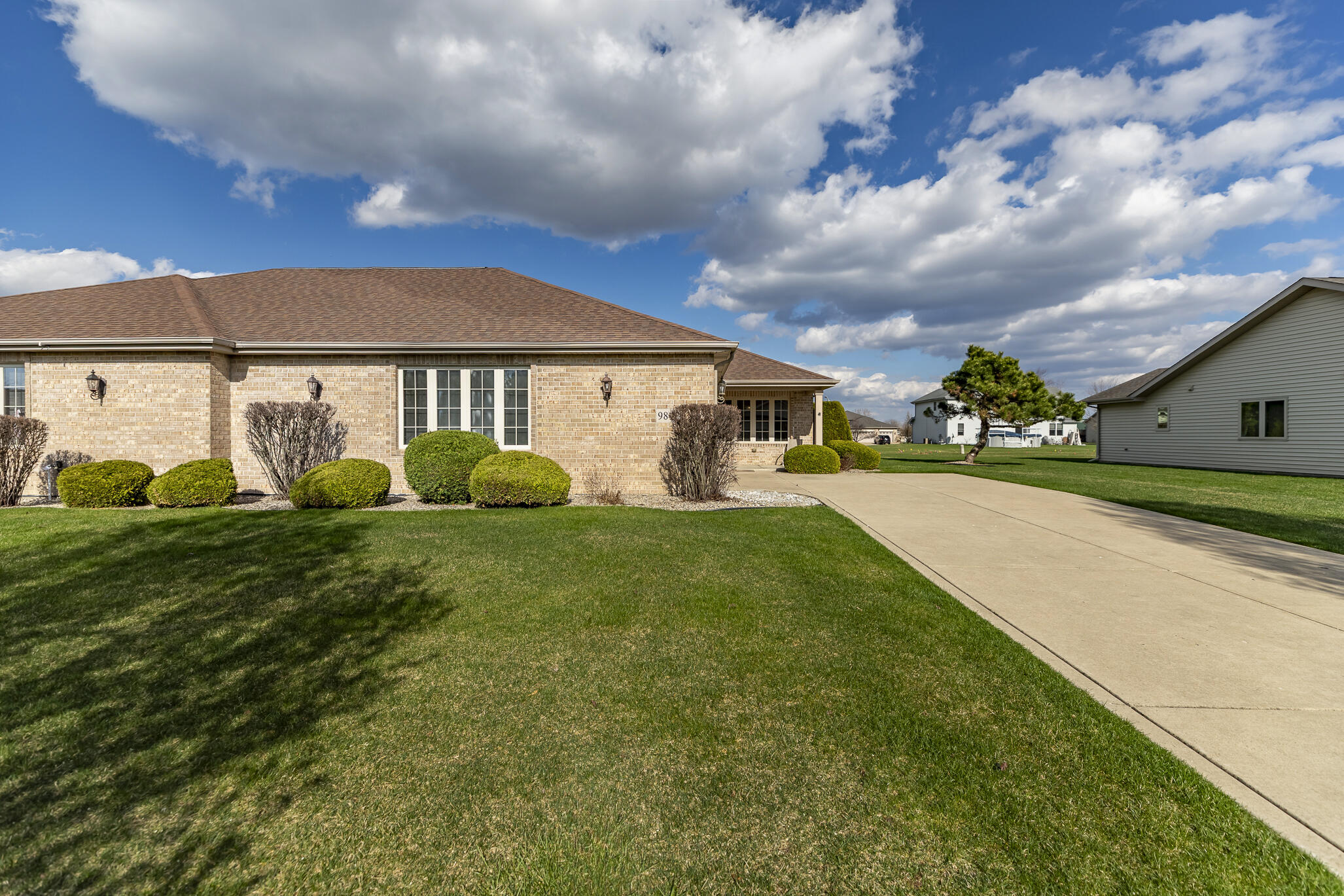 9841 Hart Street St. John, IN 46373 - Photo 2 of 28 a front view of a house with garden