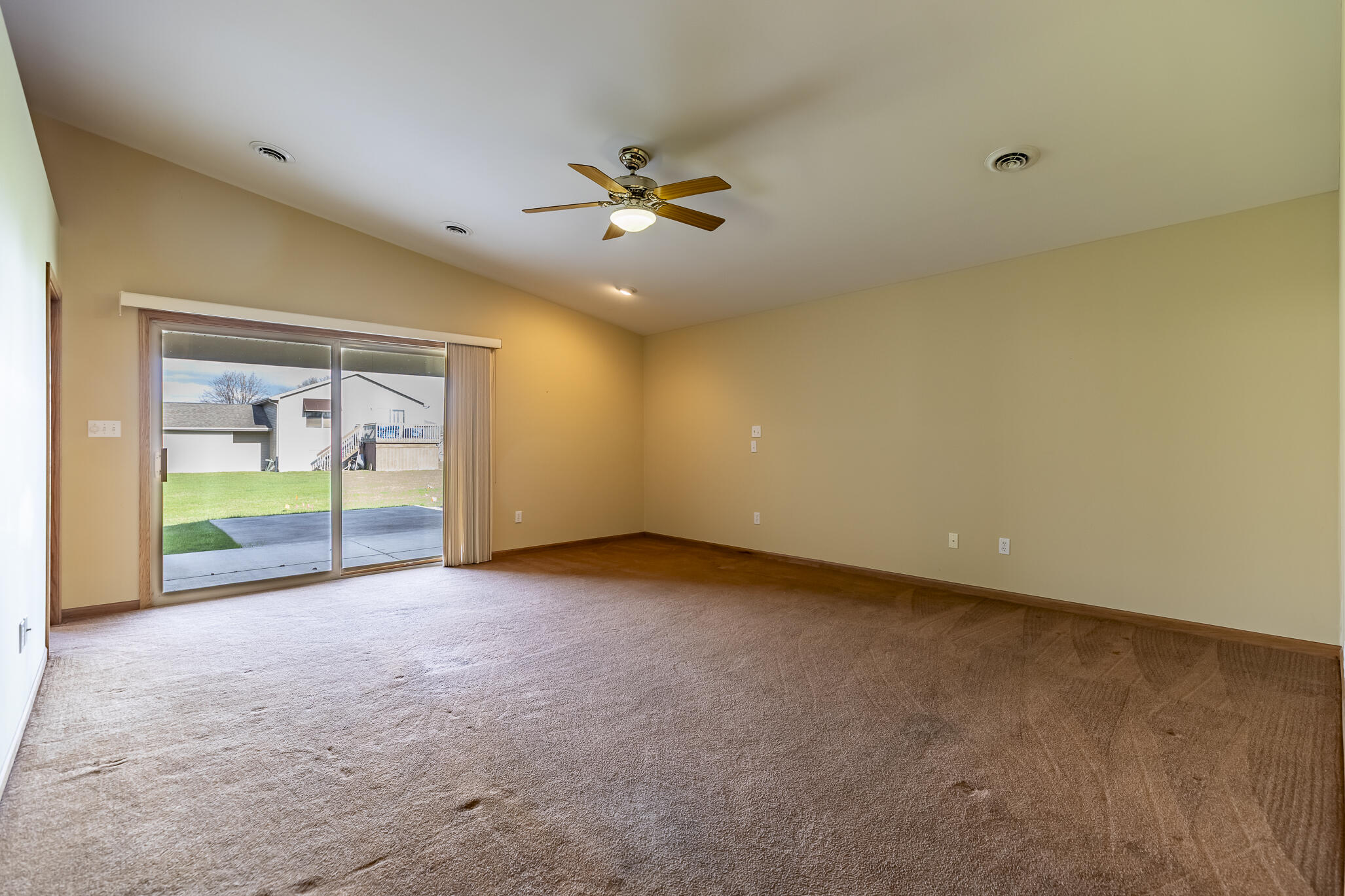 9841 Hart Street St. John, IN 46373 - Photo 5 of 28 a view of an empty room with a window