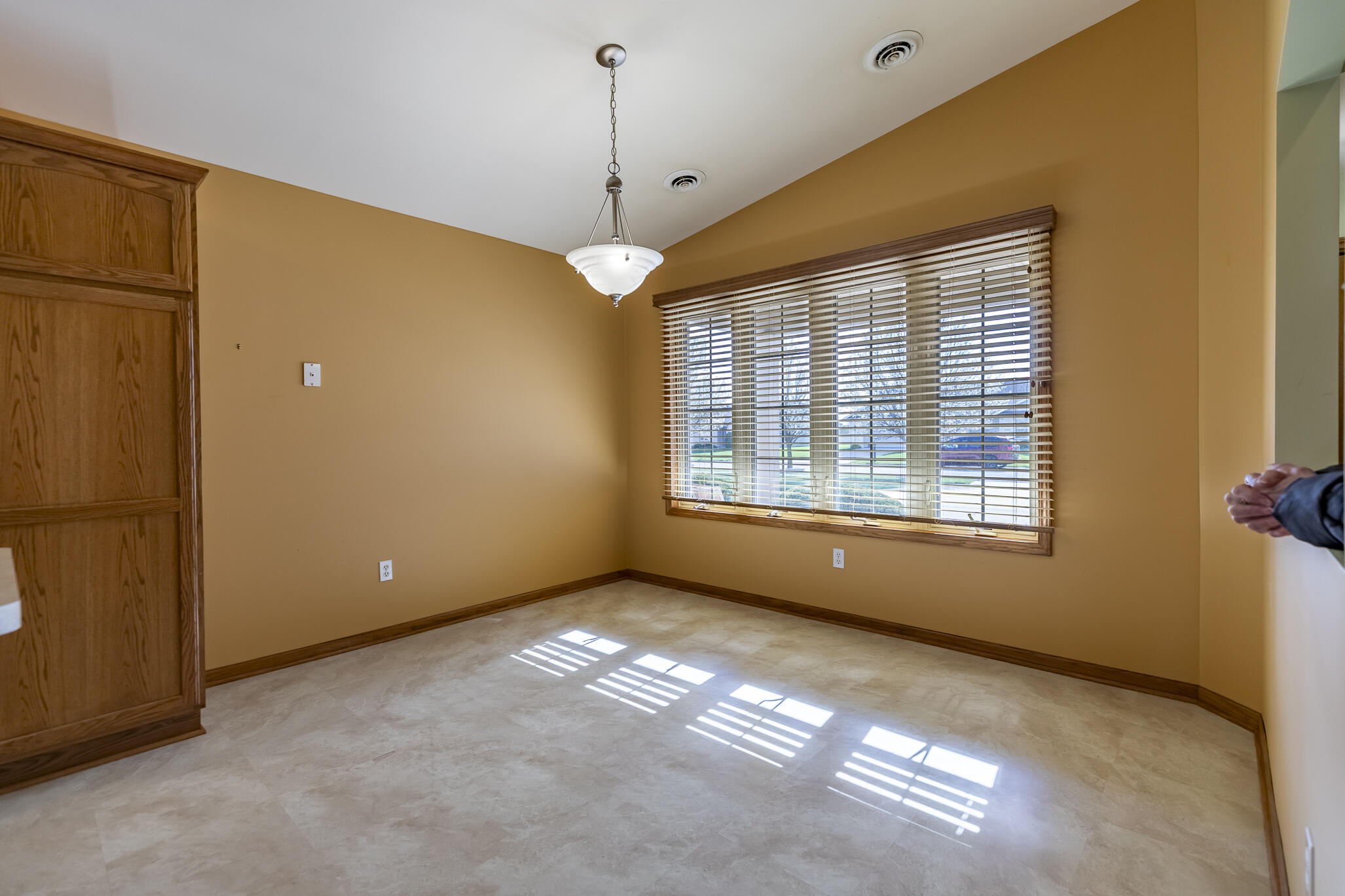 9841 Hart Street St. John, IN 46373 - Photo 10 of 28 a view of an empty room with a window