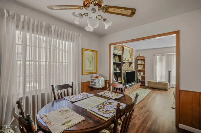 a bathroom with a granite countertop shower
