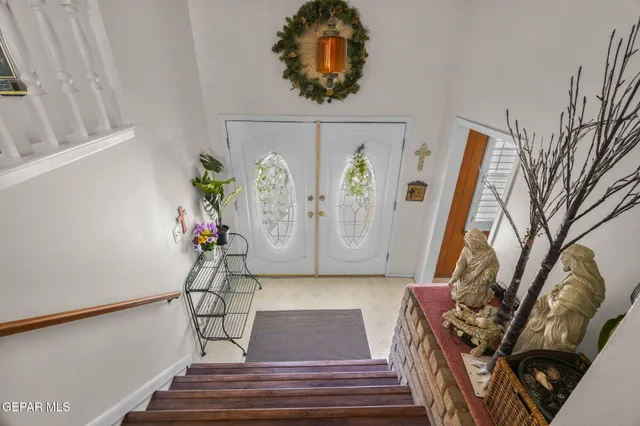 a kitchen with a sink cabinets and window