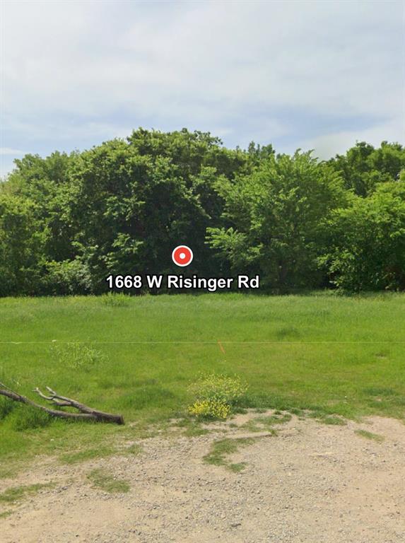 1668 West Risinger Road Fort Worth, TX 76134 - Photo 2 of 3 a view of a field