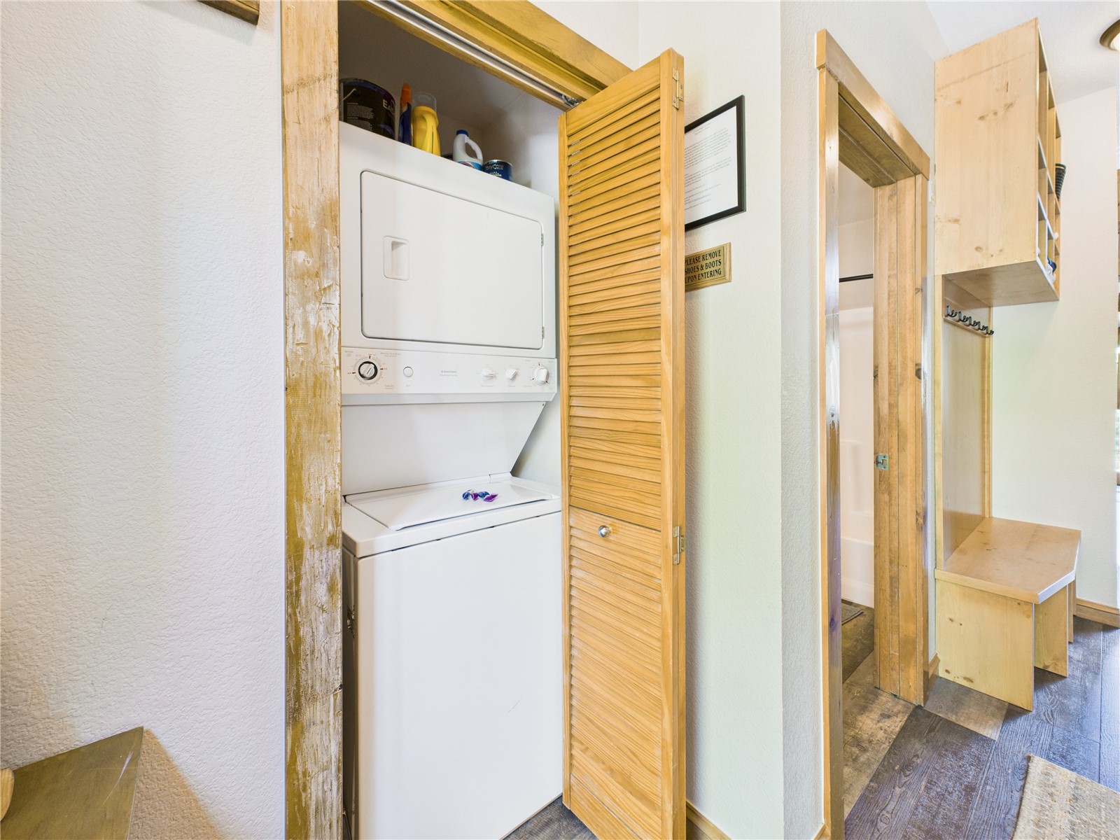 27 Lake Ridge Circle, Unit 1842 Keystone, CO 80435 - Photo 20 of 50 In-unit stacked washer and dryer tucked conveniently near entry and bath.