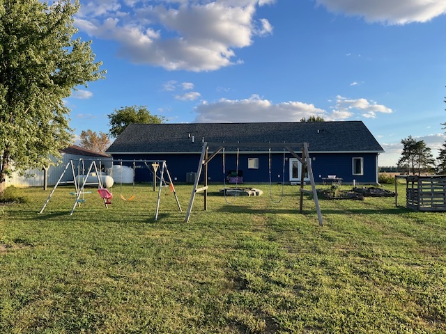 466 County Road 100 North Sadorus, IL 61872 - Photo 1 of 29 a swimming pool with outdoor seating and yard