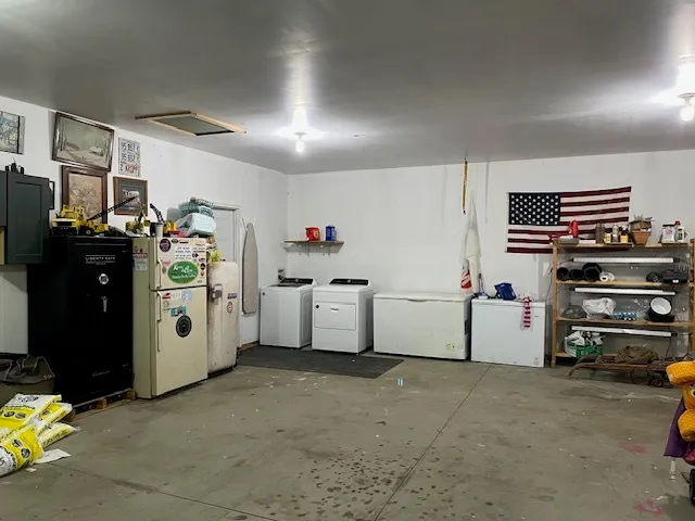 a utility room with storage and utility