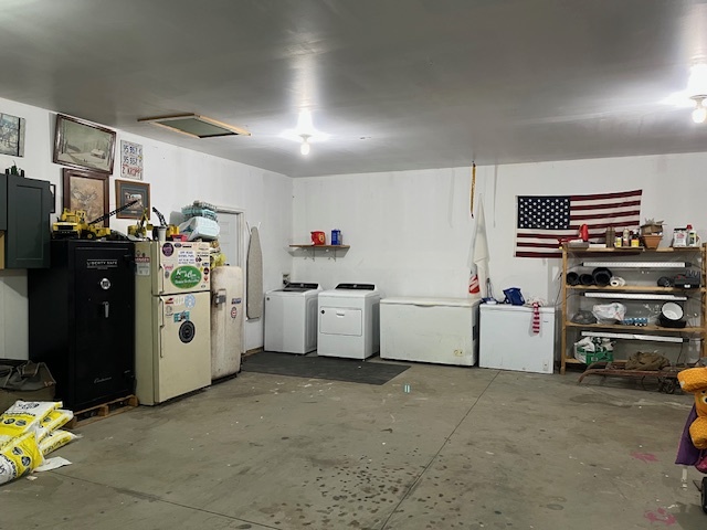 466 County Road 100 North Sadorus, IL 61872 - Photo 27 of 29 a utility room with storage and utility